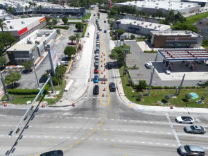 Curb, sidewalk, and roadway reconstruction along W 18 Avenue.